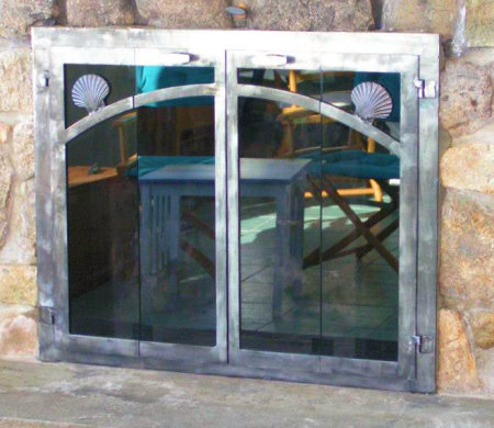 Nauset fireplace doors all natural iron, vice bi fold doors  and standard smoke glass. Comes with slide mesh